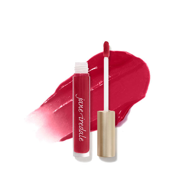 Tube of Jane Iredale HydroPure Hyaluronic Acid Lip Gloss with doe foot applicator cap removed and sample enlarged product application behind in shade Berry Red