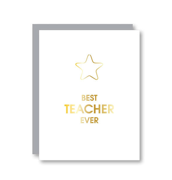White greeting card with silver envelope behind says, "Best Teacher Ever" in metallic gold foil and includes a star-shaped paper clip