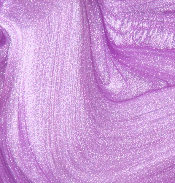 Closeup of shimmery purple nail polish