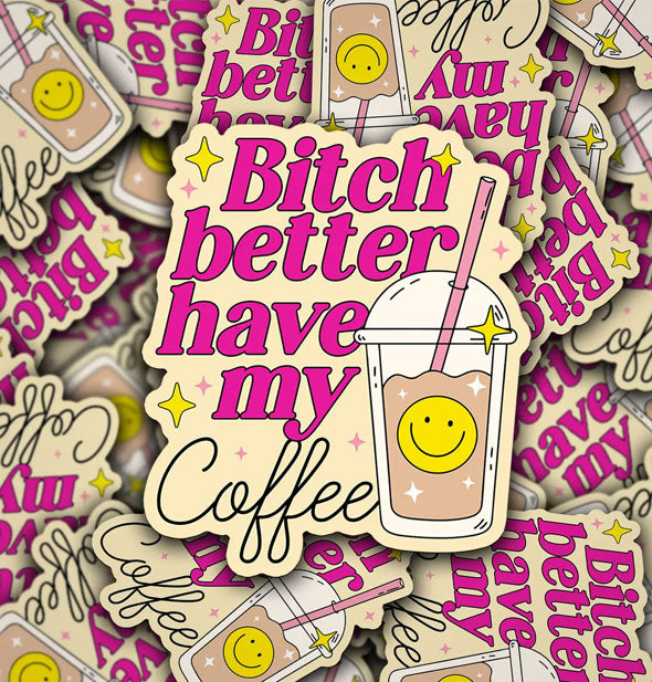 Pile of stickers with illustration of a domed drink cup with straw say, "Bitch better have my coffee" in both italic pink and black script lettering