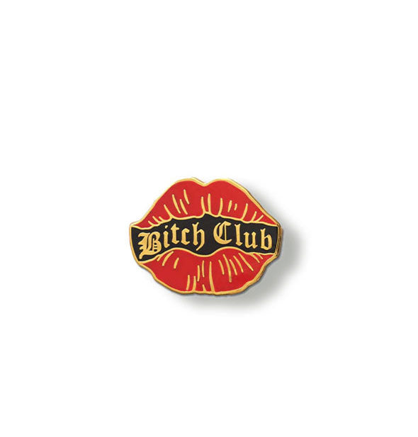 Enamel pin with red lips accented by gold edging says, "Bitch Club" across a center black banner in gold Gothic-style lettering