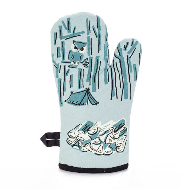 Light blue oven mitt features monochromatic woodsy scene with tent, firewood, and an own in a tree