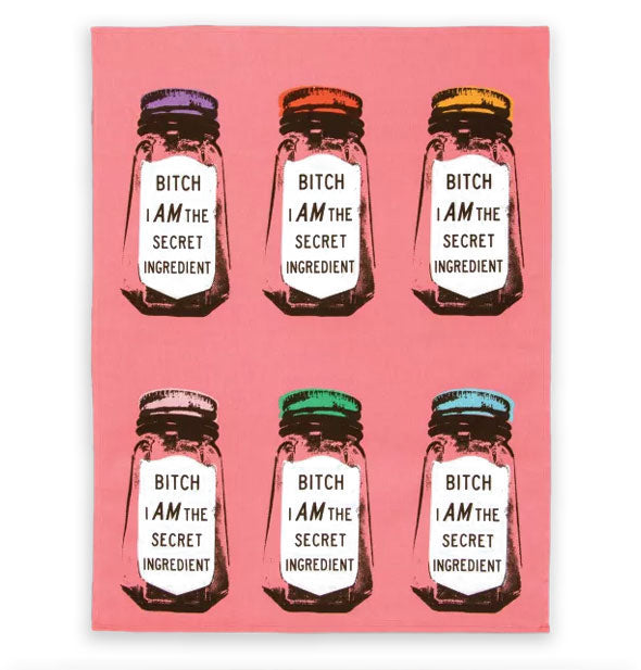 Pink dish towel with repeated illustrations of a spice bottle in the style of Andy Warhol, each with a different cap color, and all with the same white label that says, "Bitch I AM the secret ingredient"
