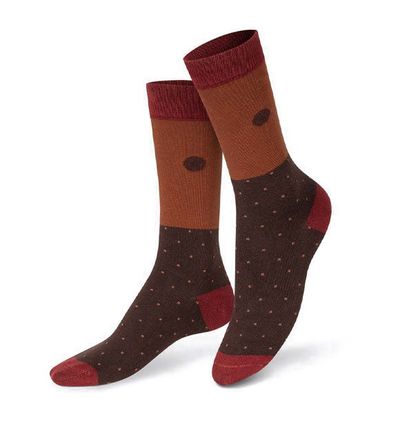 Pair of dark-toned socks with small polkadot pattern on the bottom half and nipple accents above the ankles