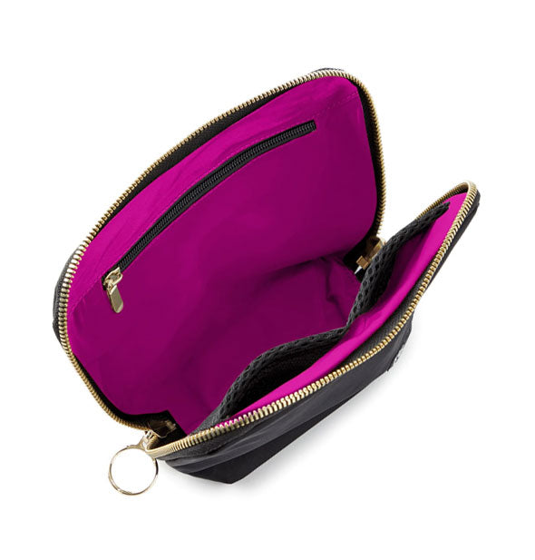 Fully unzipped Everyday Makeup Bag reveals pink lining and interior zip and mesh pockets