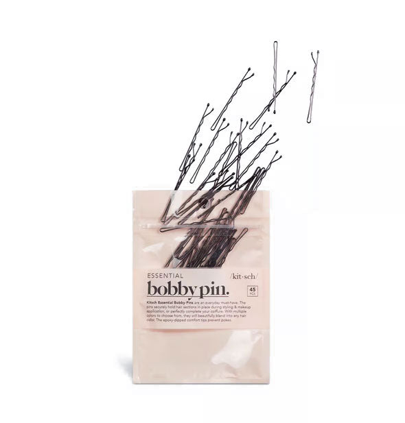 Pack of Essential Bobby Pins by Kitsch with the pins appearing to fly out of the packaging