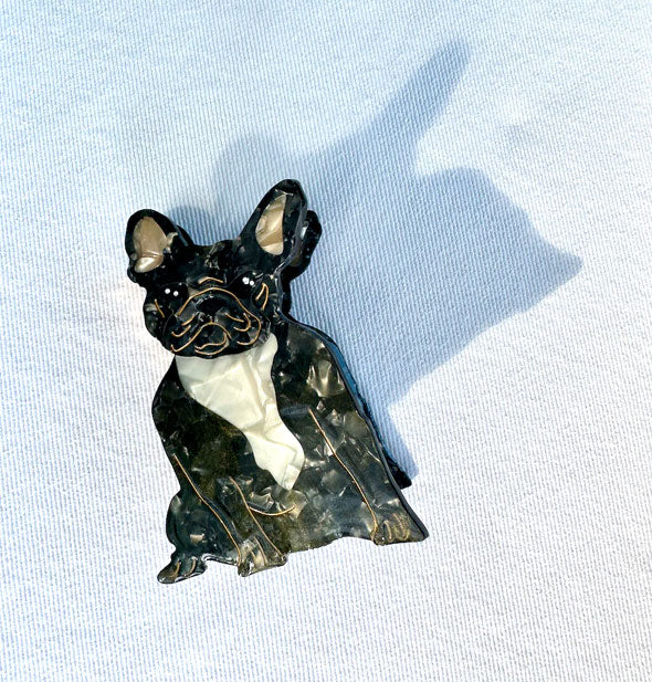 Black and white quartz-effect French bulldog hair clip with line-drawn details