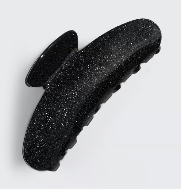 Black hair claw clip with a glittery finish