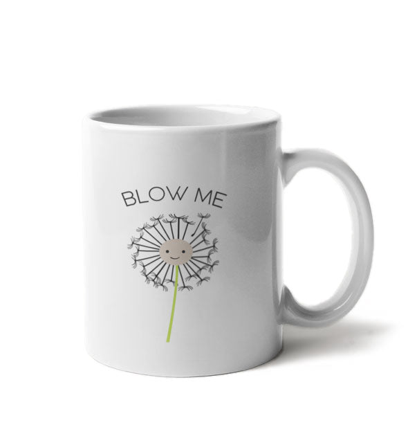 White coffee mug features a smiling dandelion illustration with the words, "Blow Me"