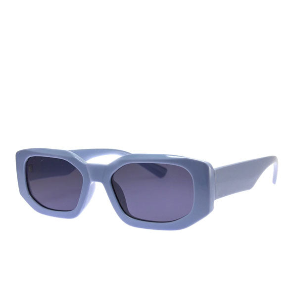 Blue sunglasses with angular shape and grayish-blue lenses