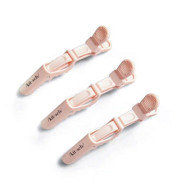 Three pink crocodile clips by Kitsch