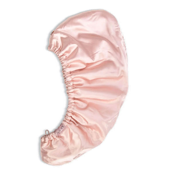 Blush satin hair wrap by Kitsch shown laying flat