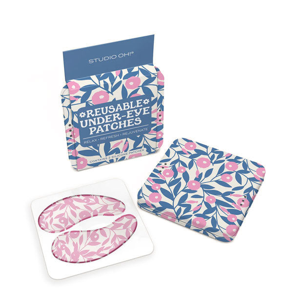 Contents of the Blushing Dahlias edition of Studio Oh! Reusable Under-Eye Patches: pink and white floral print patches and pink, blue, and white floral print square storage tin