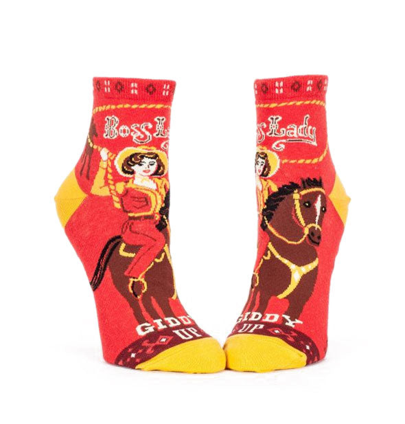Pair of socks with cowgirl motif say, "Boss Lady" and "Giddy Up"