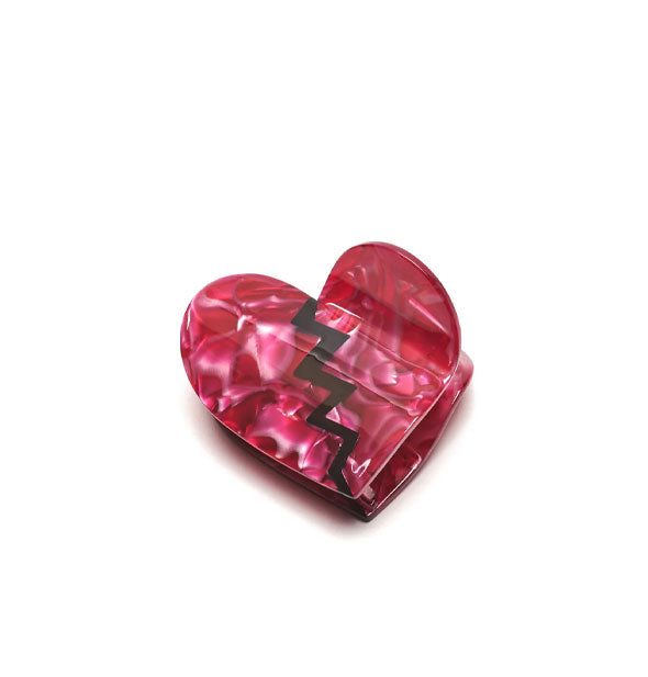 Heart-shaped dark pink quartz-effect hair clip with a black zigzag line down the middle