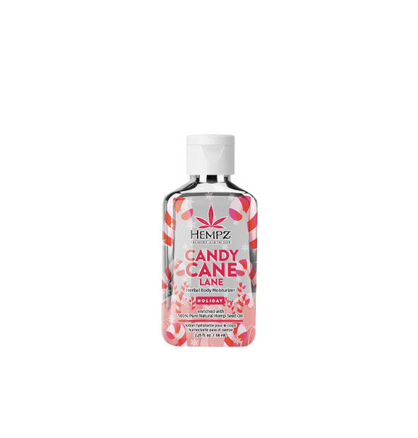 2.25 ounce bottle of Hempz Candy Cane Lane Herbal Body Moisturizer with silver bells and red ribbon attached and a red and white candy cane label motif