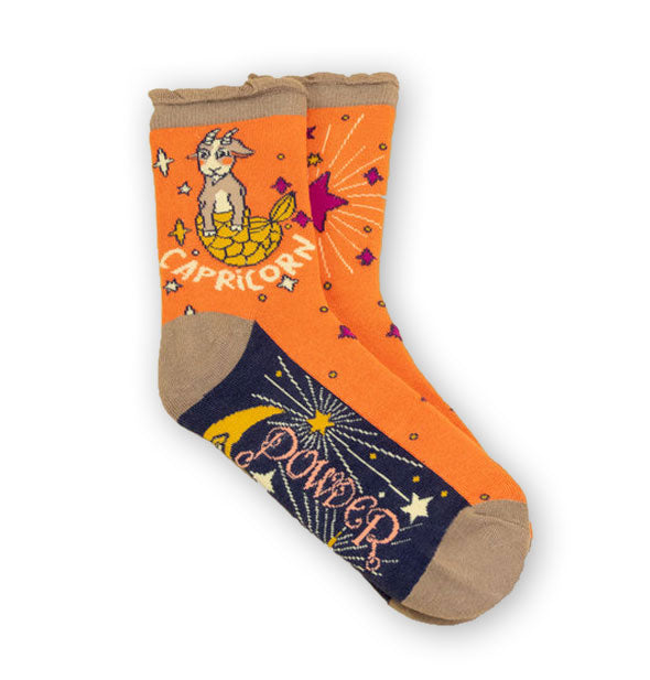 Pair of Capricorn socks by Powder feature astrology-themed sea-goat design