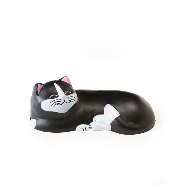 Black and white smiling cat figurine