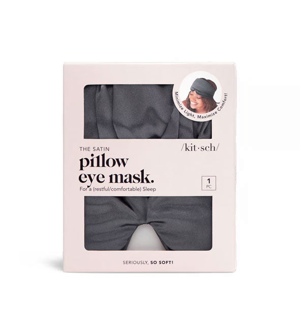 Satin Pillow Eye Mask in charcoal is visible through light pink Kitsch packaging