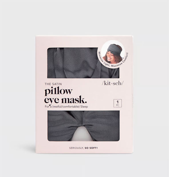 Satin Pillow Eye Mask in charcoal is visible through light pink Kitsch packaging