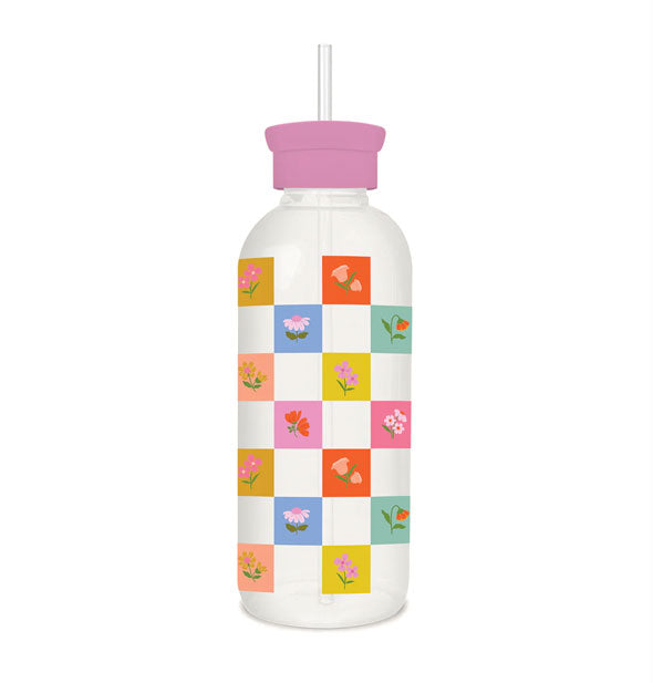 Glass water bottle with straw and pink cap features a colorful checkerboard print accented with small flower illustrations