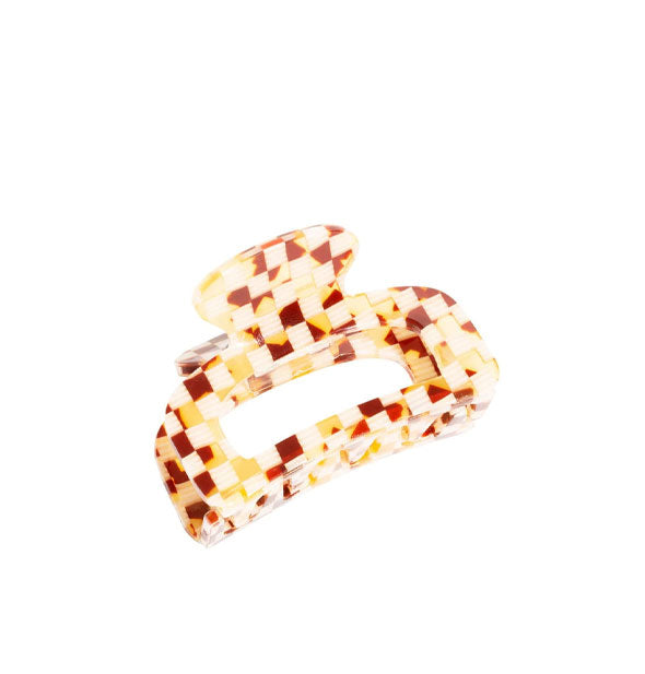 Claw clip with brown, cream, and yellow tortoise checker print