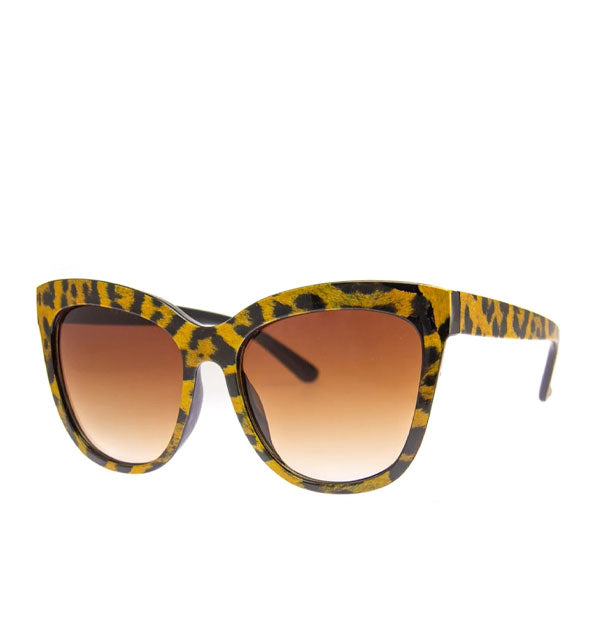 Pair of large animal print sunglasses with amber lenses