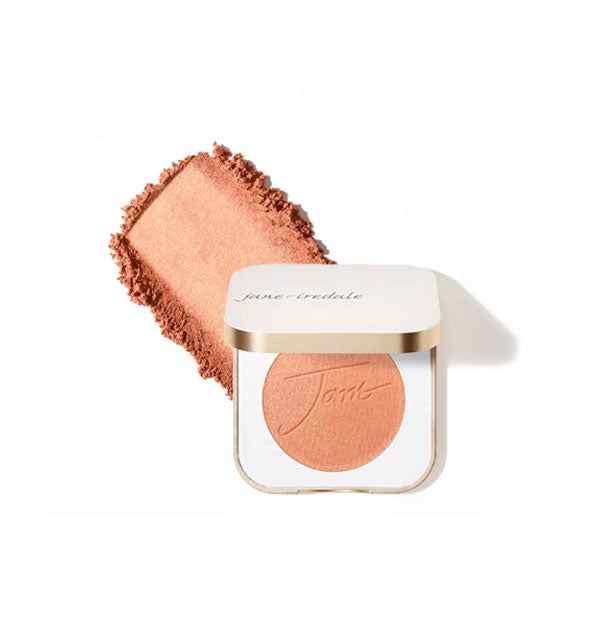 Opened square white and gold Jane Iredale compact reveals powder blush compact inside in shade Cherry Blossom