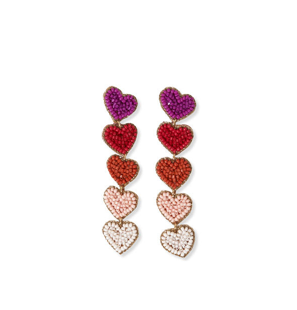 Pair of earrings each with five beaded hearts in purple, red, pink, and white tones