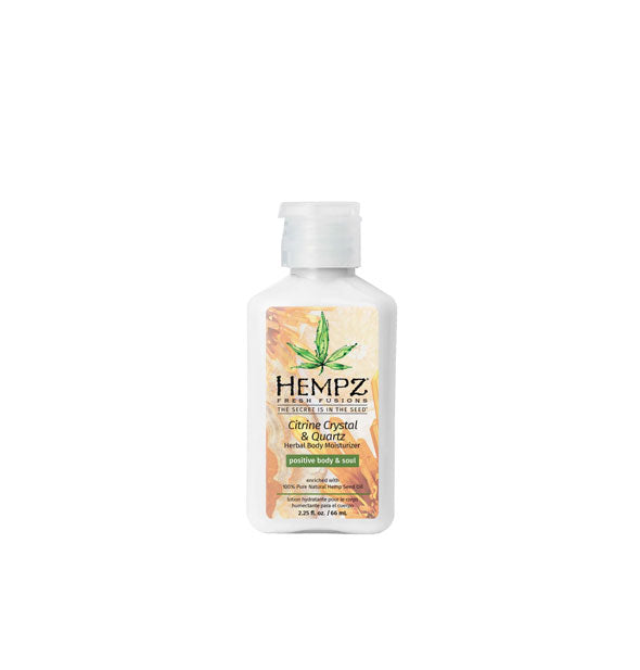 White 2.25 ounce bottle of Hempz Fresh Fusions Citrine Crystal & Quartz Herbal Body Moisturizer with amber-colored crystal label motif and green design accents