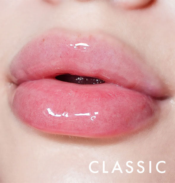 Closeup of model's lips wearing Kara Beauty Level Up! Nourishing Lip Gloss in Classic clear
