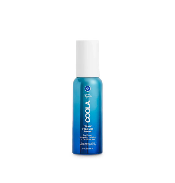 Blue ombre 3.4 ounce bottle of Coola Classic Face Mist Sunscreen with white cap and white lettering