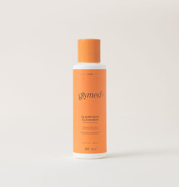 Orange and white 8 ounce bottle of GlyMed+ Clear Skin Cleanser