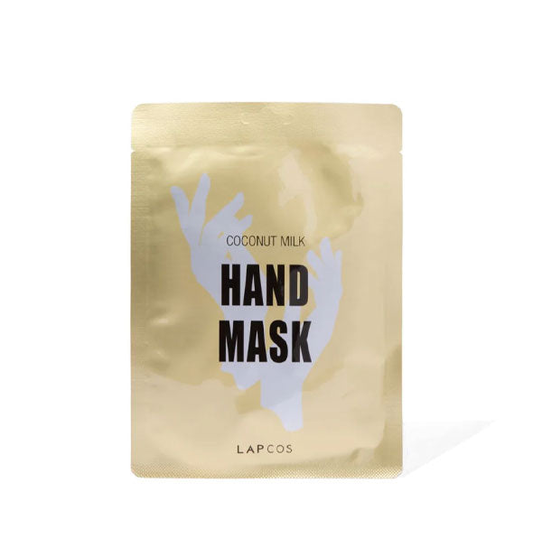 Metallic gold Lapcos Coconut Milk Hand Mask packet with black lettering and white hands graphci