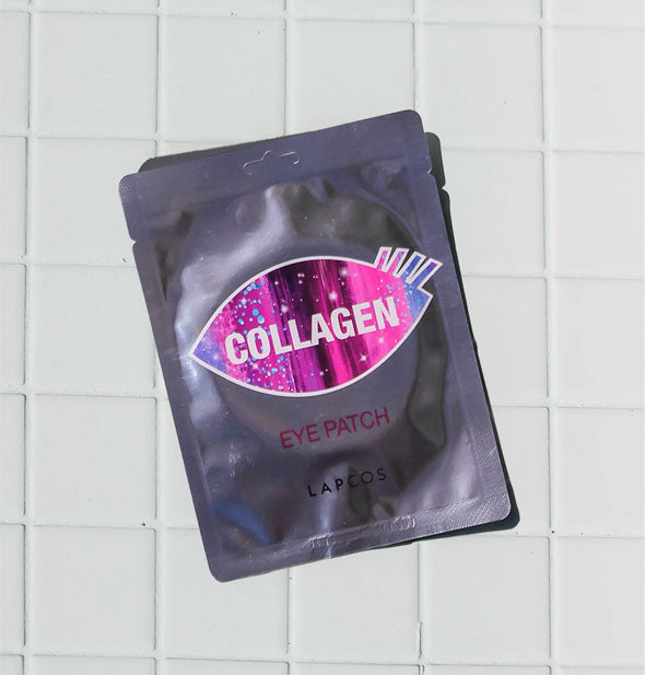 Collagen Eye Patch packet on white tiled surface