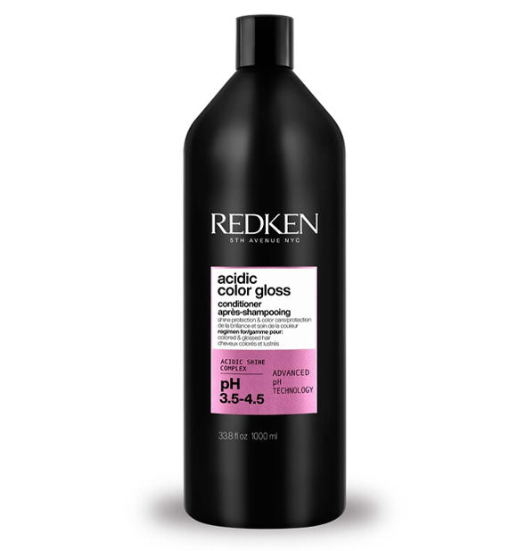 Black 33.8 ounce bottle of Redken Acidic Color Gloss Conditioner with pink and white label