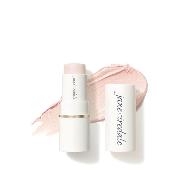 White tube of Jane Iredale Glow Time Highlighter Stick with cap removed overtop an enlarged sample product application in shade Cosmos