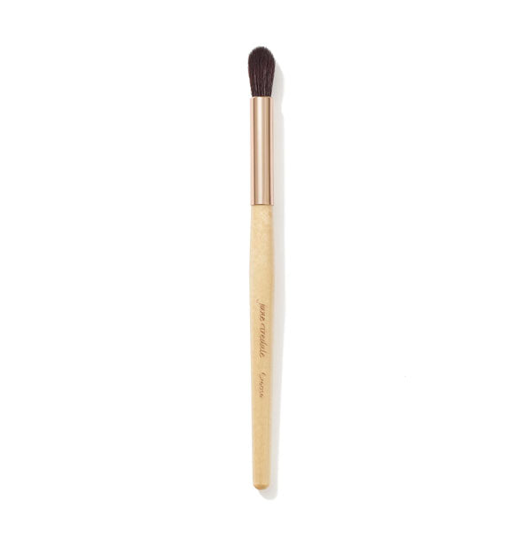 Jane Iredale Crease Brush with wooden handle, gold ferrule, and elongated, rounded bristle head
