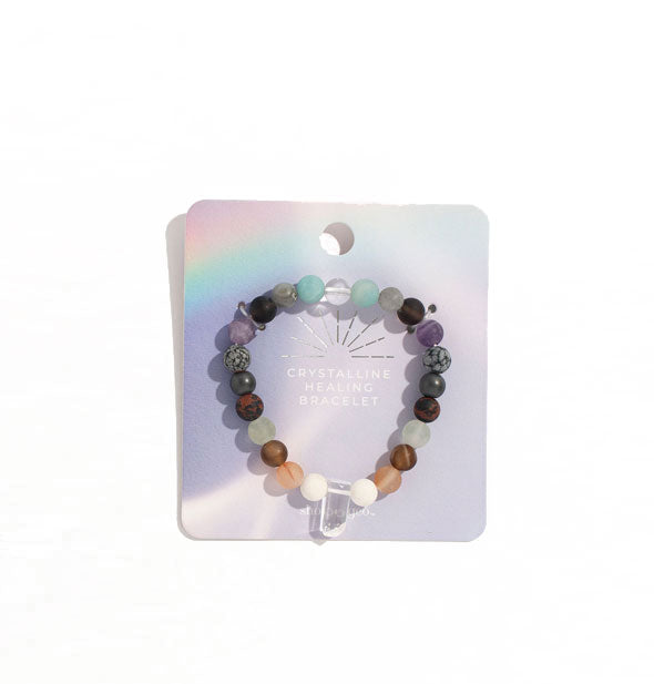 Crystalline Healing Bracelet with colorful stone beads on a rainbow-effect card