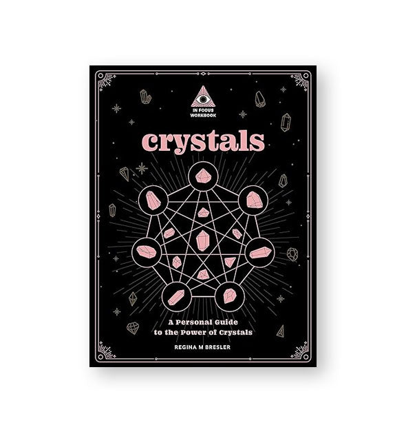 Black cover of Crystals: A Personal Guide to the Power of Crystals features light pink artwork and lettering