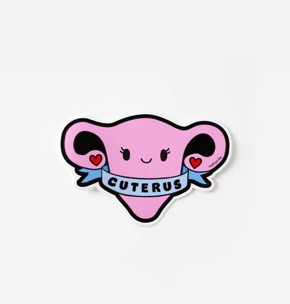 Cartoon uterus sticker with smiley face and red hearts in place of ovaries is wrapped in a blue banner that says, "Cuterus"