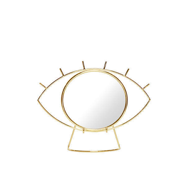 Thin gold-framed eye-shaped mirror