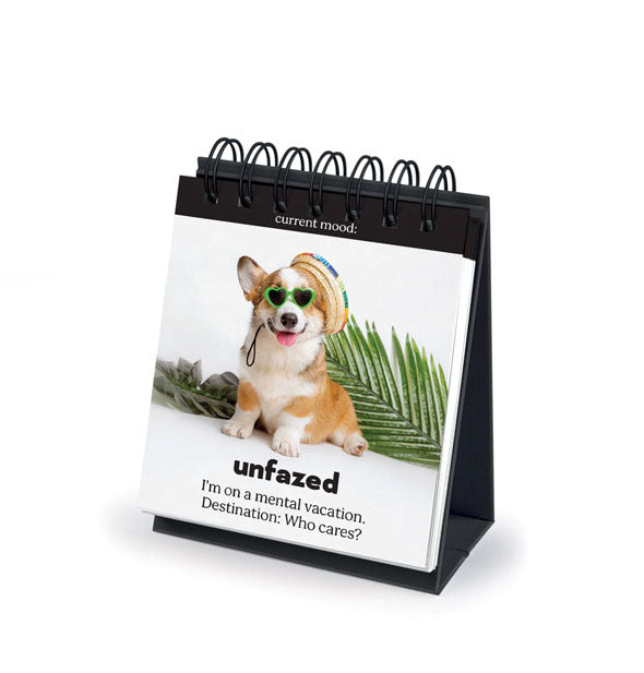 Daily Doggo Desktop Flip Book features a page that reads, "Unfazed: I'm on a mental vacation. Destination: Who cares?" underneath an image of a Welsh Corgi puppy wearing a sombrero and green heart-shaped sunglasses in front of palm fronds
