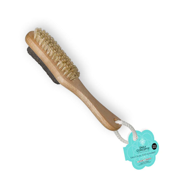 Wooden foot scrubber with bristled side and pumice side and a teal Daily Concepts tag attached by a white rope loop