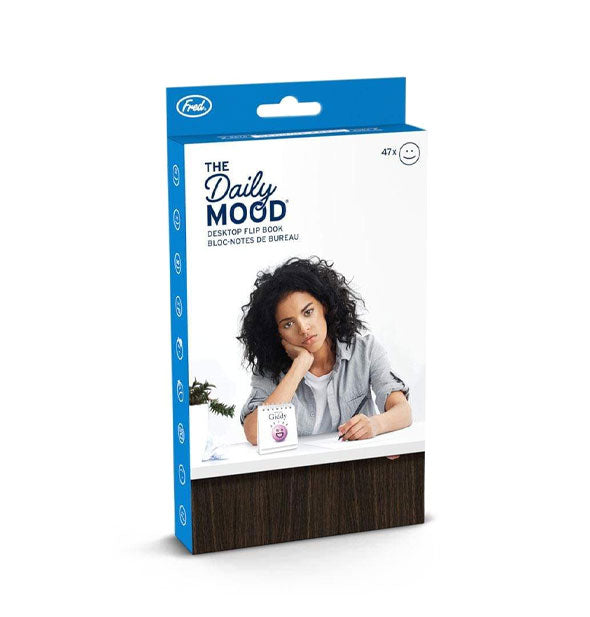 The Daily Mood Desktop Flip Book packaging depicts a tired-looking employee at their desk resting head in hand near a flip book turned to the mood, "Giddy"