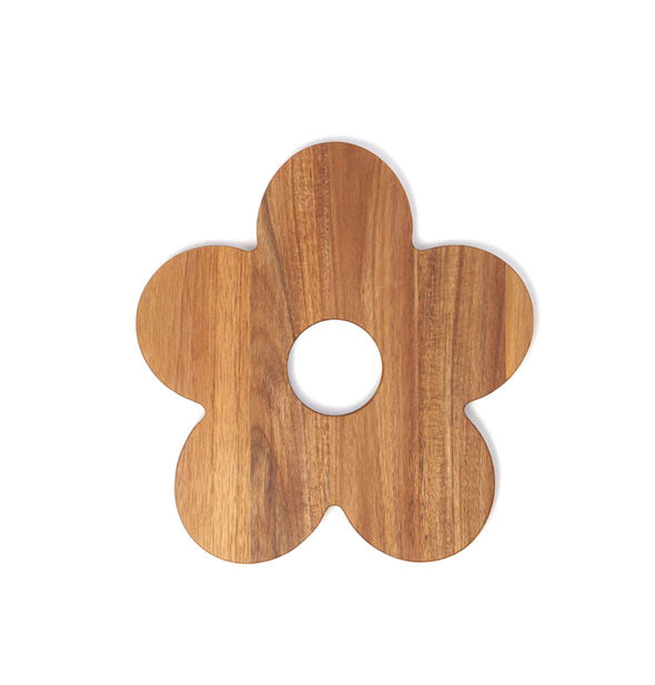 Wooden daisy-shaped serving board with hole in the center