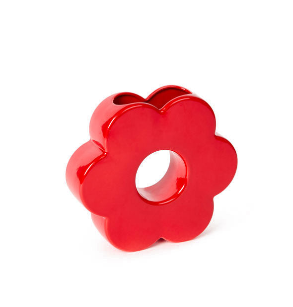 Red daisy-shaped flower vase with a hole in the center