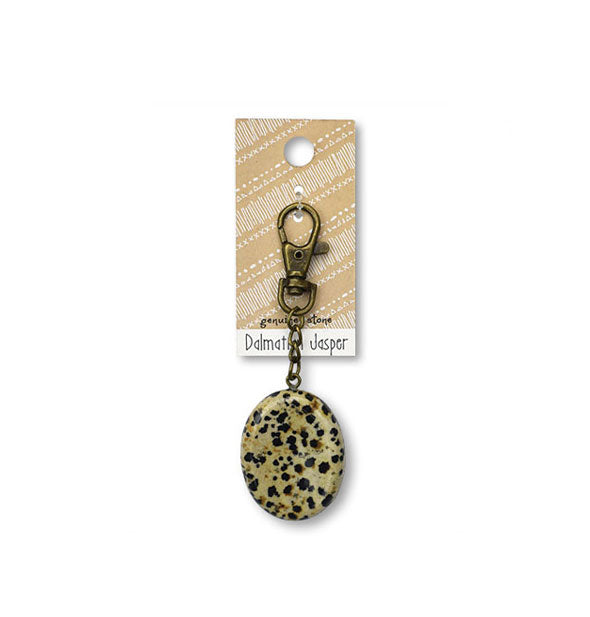 Dalmatian Jasper stone keychain on brass hardware attached to blister card