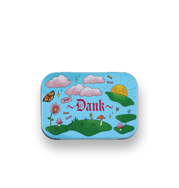 Rectangular sky blue tin lid with rounded corners features whimsical illustrations of a smiling sun, puffy clouds, orange butterfly, pink flower, mushrooms, patches of grass, and says, "Dank" in the center in red Gothic lettering flanked by two tildes