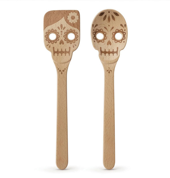 Wooden sugar skull serving utensils: one square spatula and one rounded spoon, both with eye cutouts